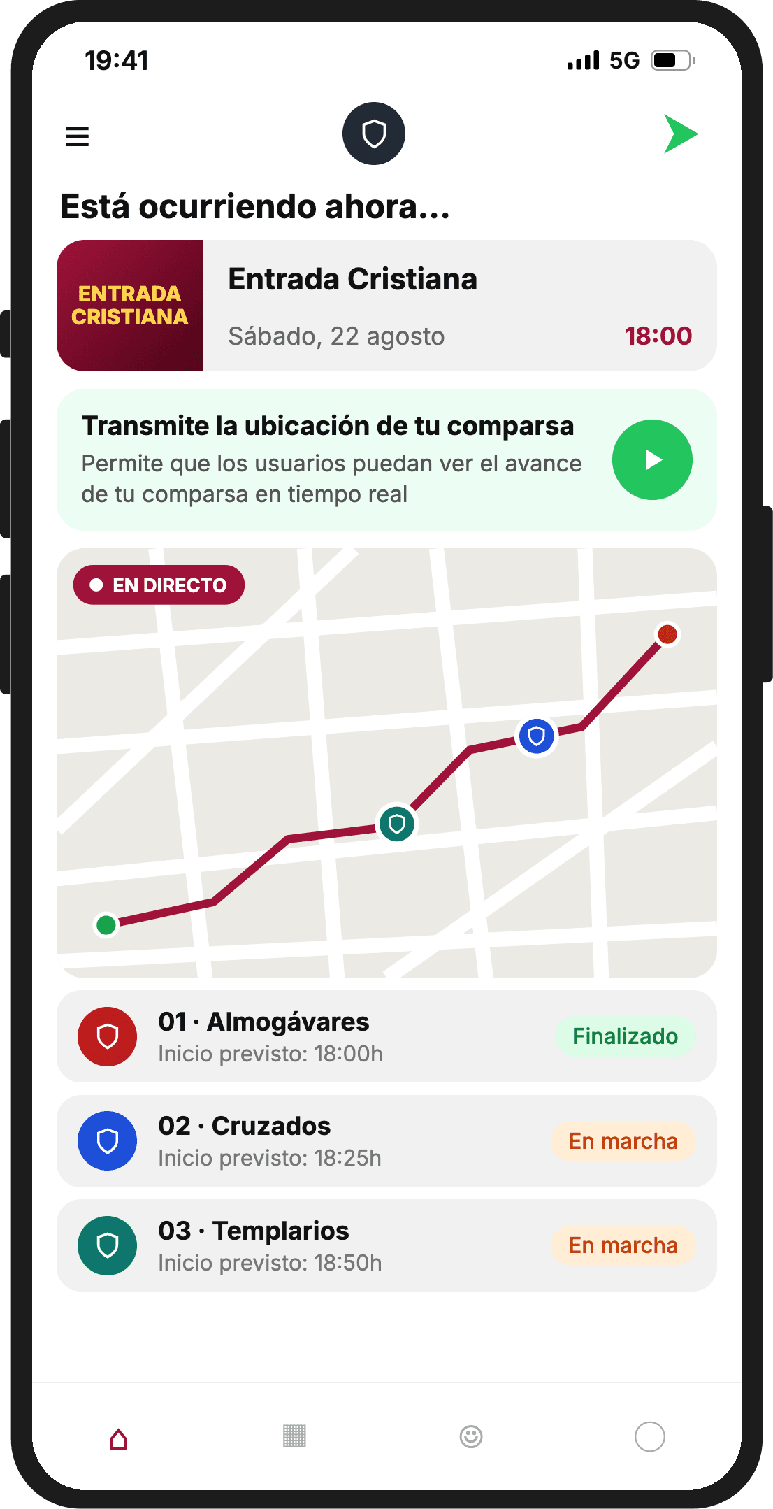 Inicio de la app con la tarjeta Transmite la ubicación de tu comparsa y un botón de play, el mapa en directo del desfile y la lista de comparsas con su estado